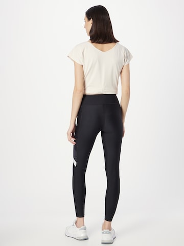 UNDER ARMOUR Skinny Sporthose in Schwarz