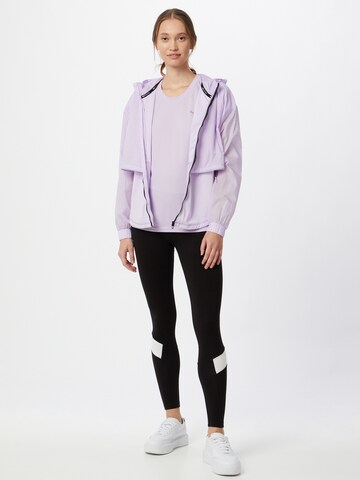 purpurinė PUMA Sportiniai marškinėliai be rankovių