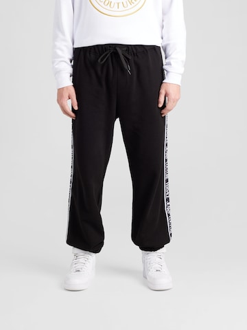 Effilé Pantalon Versace Jeans Couture en noir : devant