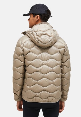 PEAK PERFORMANCE Steppjacke M Helium Down Hood Jacket in Braun