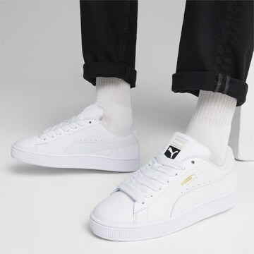 Baskets basses PUMA en blanc : devant