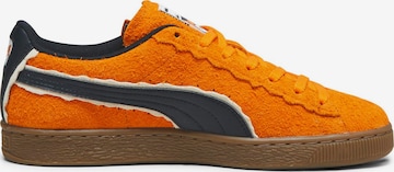 Baskets basses PUMA en orange