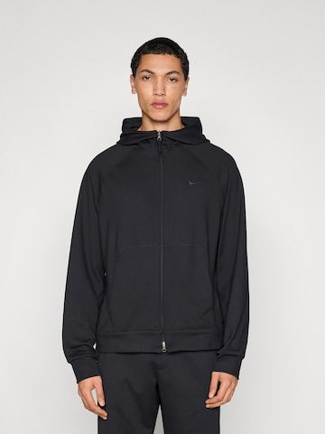 Giacca di felpa sportiva di NIKE in nero: frontale