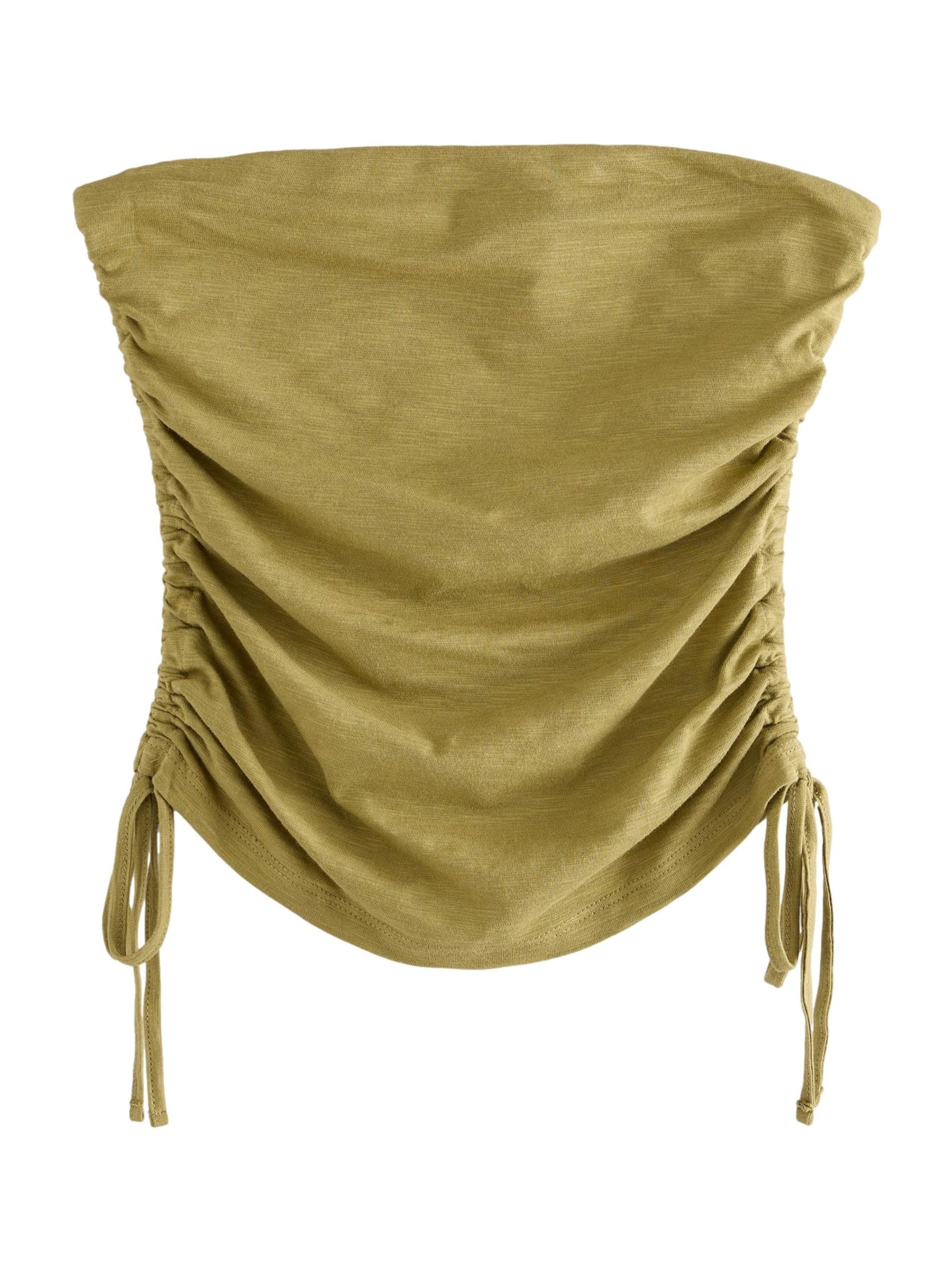 Top di Next in verde: frontale