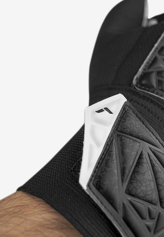 REUSCH Athletic Gloves 'Attrakt Starter Solid' in Black