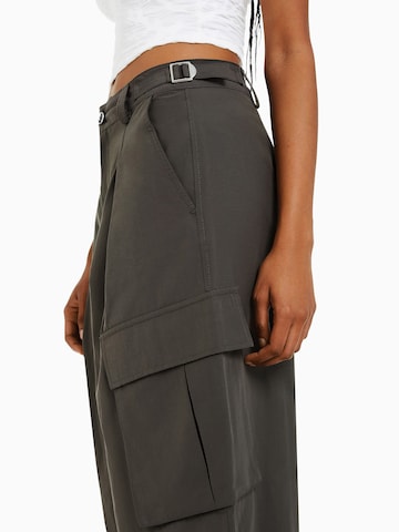 Bershka Tapered Pleat-front trousers in Green