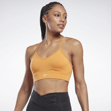 Reebok Bustier Urheilurintaliivit värissä oranssi: etupuoli