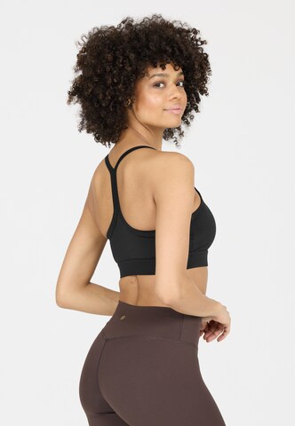 Athlecia Low support Sport bh 'Bloom V2' in Zwart