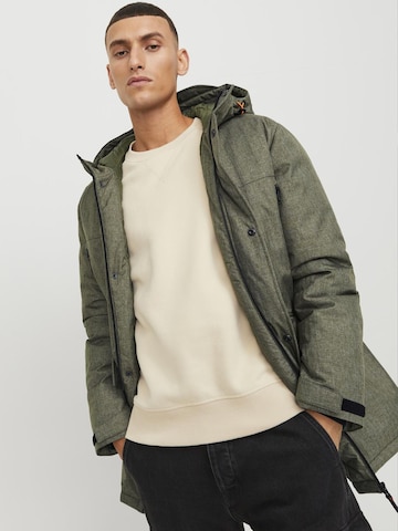 Parka de iarnă 'Black' de la JACK & JONES pe verde