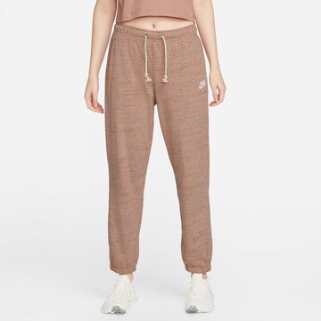 Nike Sportswear Tapered Pants in Pink: front