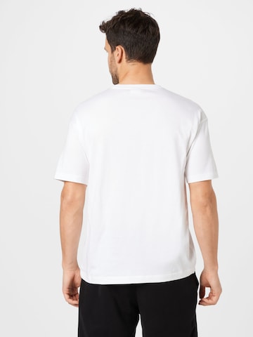 Maglietta 'X Stranger Things' di Champion Authentic Athletic Apparel in bianco