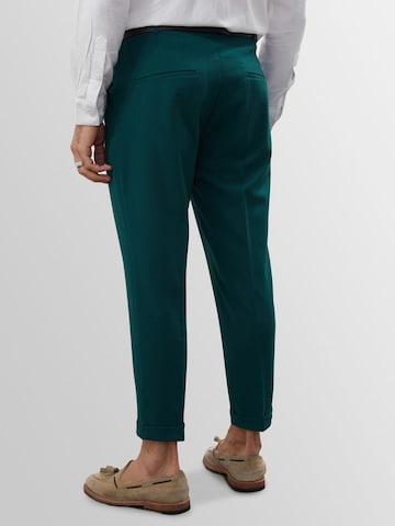 Antioch Tapered Pleat-front trousers in Green