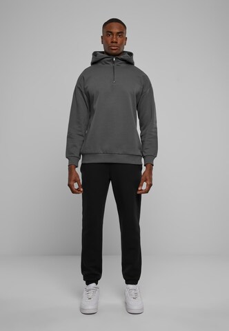 Urban Classics Свитшот в Серый