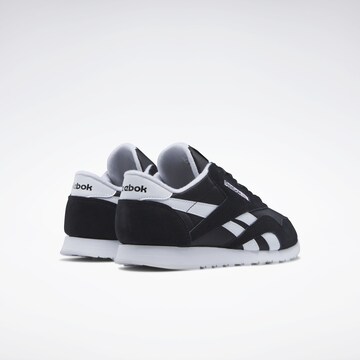 Reebok Platform trainers in Black