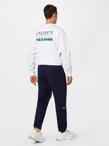 Tapered Pantaloni de la LACOSTE pe albastru