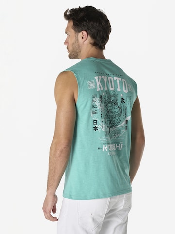 KOROSHI Paita värissä vihreä