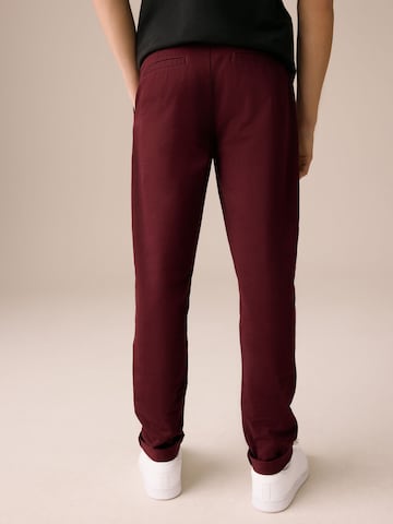 Next Slimfit Housut värissä punainen
