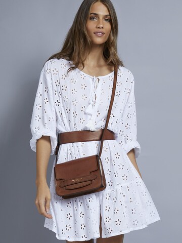 The Bridge Crossbody bag in Pink: front