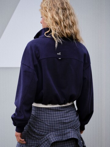 Sweat-shirt self. en bleu