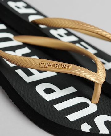 Superdry T-Bar Sandals in Gold