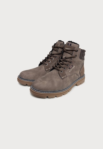 s.Oliver - Botas con cordones en verde