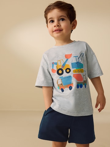 Next Set in Blauw: voorkant