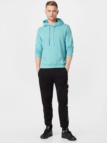 Champion Authentic Athletic Apparel Sweatshirt in Blue