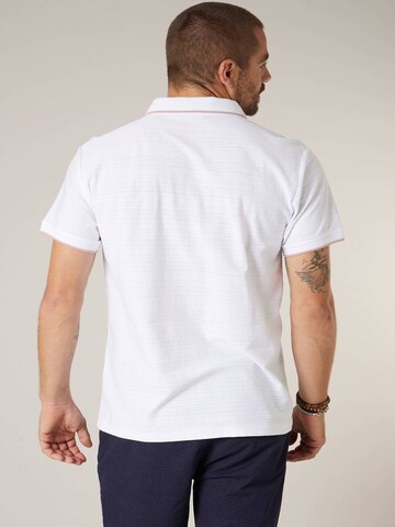 T-Shirt 'REVOLTIX ' Deeluxe en blanc
