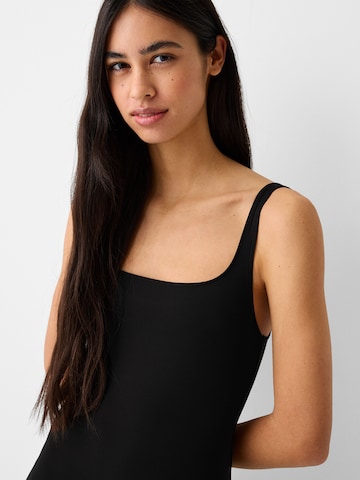 Tuta jumpsuit di Bershka in nero