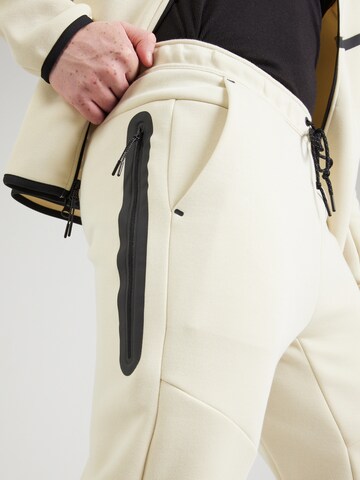 Nike Sportswear Tapered Bukser 'TCH FLC' i grøn