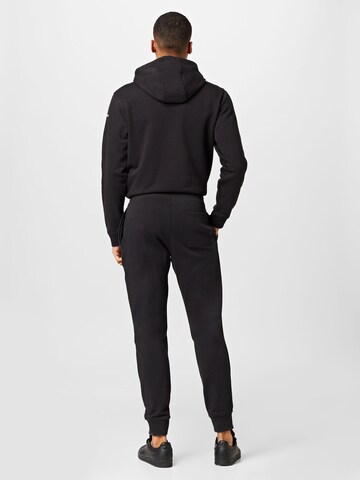 Tapered Pantaloni di COLUMBIA in nero