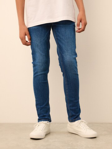 Next Скинни Джинсы в Синий: спереди