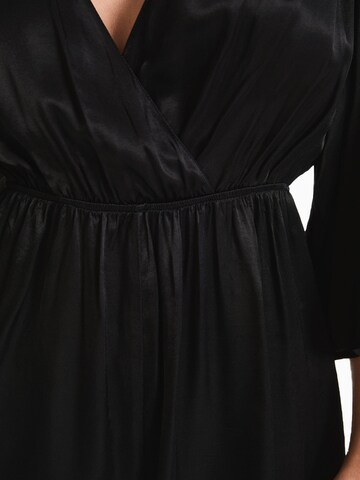 Tuta jumpsuit di Bershka in nero