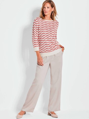 Goldner Strickpullover in Weiß