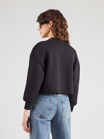 ARMANI EXCHANGE Sweatshirt i svart