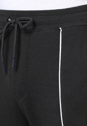 Campus Sutra Tapered Hose 'Jams' in Blau