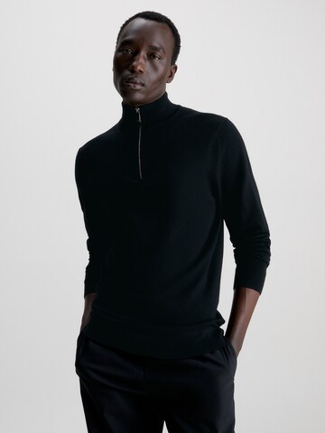 Pull-over Calvin Klein en noir : devant