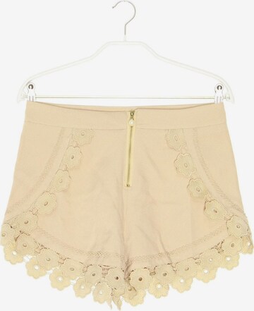 UNBEKANNT Shorts in S in Beige: front