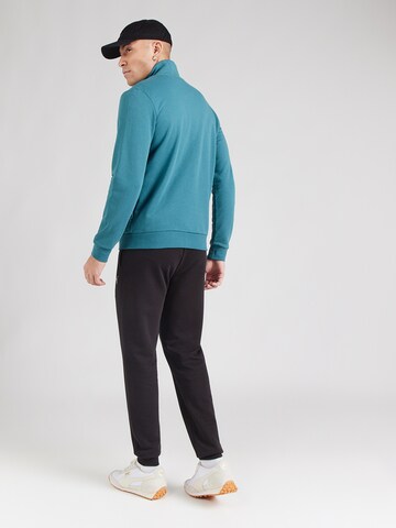 PUMA Тренировочный костюм 'Class' в Зеленый