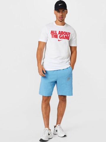 Nike Sportswear Normální Kalhoty 'Revival' – modrá