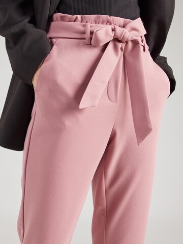 VERO MODA Tapered Housut värissä vaaleanpunainen