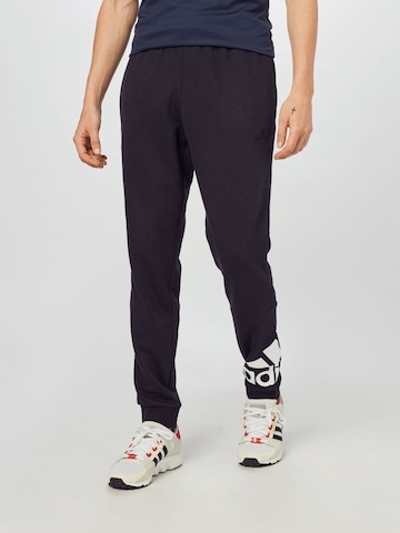 ADIDAS SPORTSWEAR Tapered Workout Pants 'Essentials French Terry Tapered Cuff Logo' in Black: front