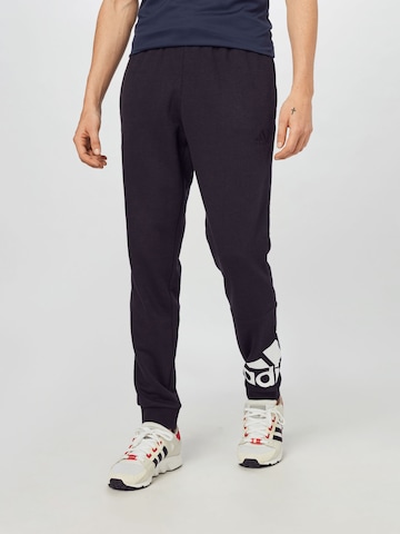 ADIDAS SPORTSWEAR Tapered Sports trousers 'Essentials French Terry Tapered Cuff Logo' in Black: front