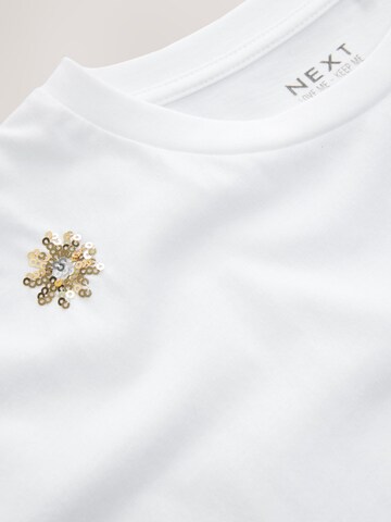 T-Shirt Next en blanc