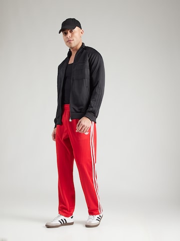 Regular Pantaloni 'FIREBIRD' de la ADIDAS ORIGINALS pe roșu