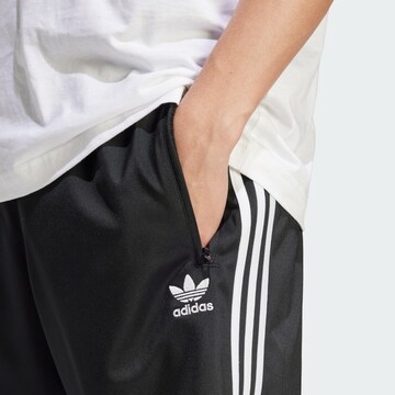 ADIDAS ORIGINALS Loosefit Broek 'Adicolor Firebird' in Zwart