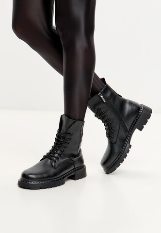 CESARE GASPARI Lace-up bootie in Black