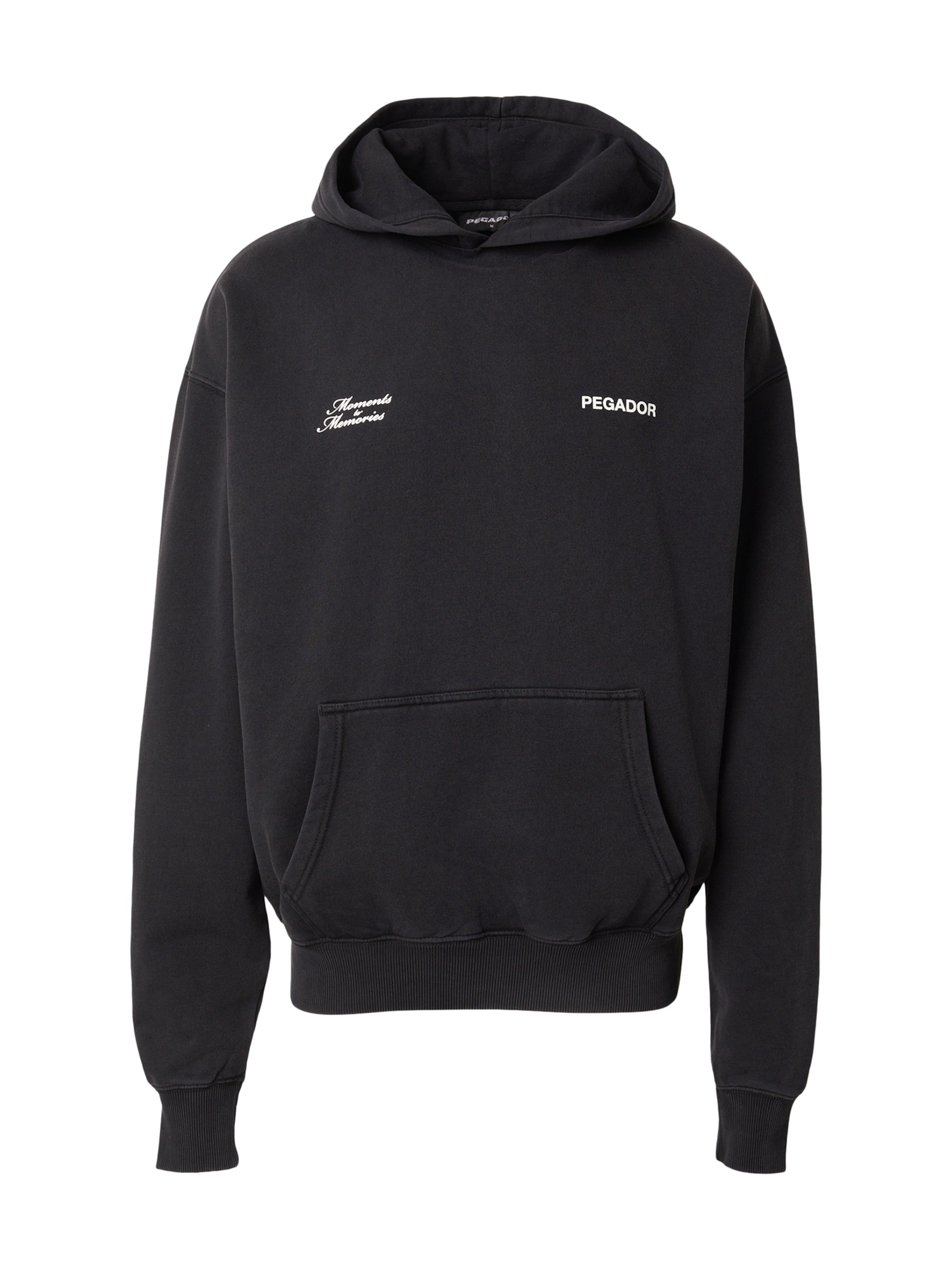 Megztinis be užsegimo 'Rochefort' iš Pegador, spalva – juoda / balta, Prekių apžvalga