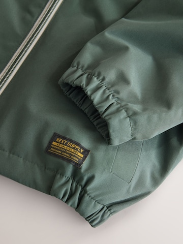 Next Демисезонная куртка в Зеленый