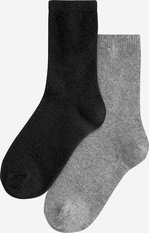 Next Sockor i svart: framsida